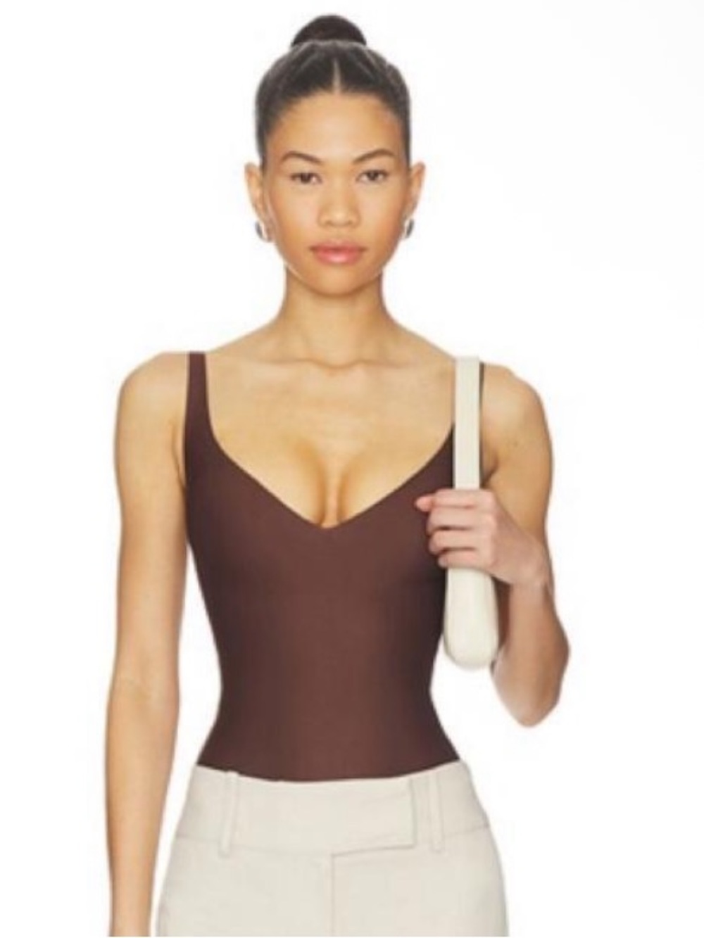 SKIMS
Unlined Plunge Thong Bodysuit size XXS in cocoa gently used